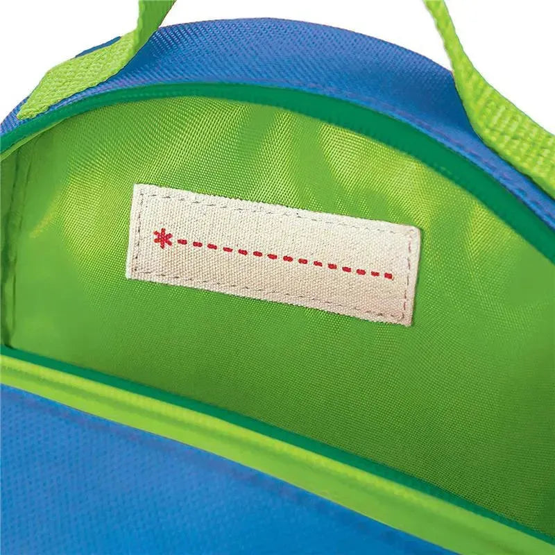 Interior view of the Skip Hop Zoo Mini Backpack in Dino design, featuring a green lining and a sewn-in name label.