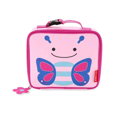 Butterfly-shaped lunch bag by Skip Hop, featuring a smiling face, pink color, and blue accent details.