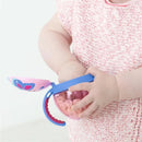 A child holding a Skip Hop Zoo Snack Cup in butterfly design, filled with colorful snacks.
