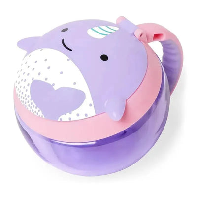 Purple narwhal-shaped snack cup with a pink lid and handle, designed for children to store snacks.