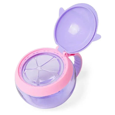 Narwhal-shaped Skip Hop Zoo Snack Cup in pastel purple and pink, designed for holding snacks with a secure lid.