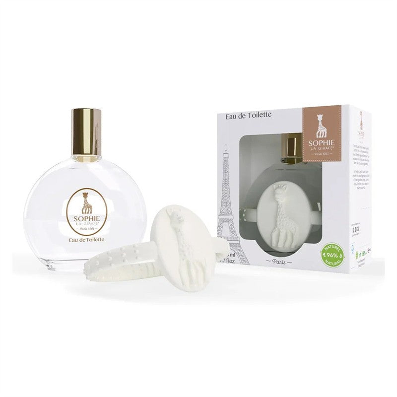 Sophie la Girafe Eau de Toilette 50 ml in a round bottle with a gold cap, accompanied by a white teething ring featuring a giraffe design.