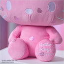 Hello Kitty plush toy celebrating its 50th anniversary, featuring pink fabric and embroidered text on its foot.