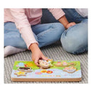 Children playing with the Spin Master Cocomelon Sound Puzzle, placing colorful, character-shaped pieces into a vibrant puzzle board.