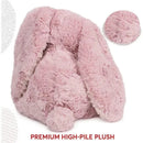 Soft pink bunny plush toy with large floppy ears and a round tail, made from premium high-pile plush fabric.