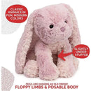 Pink bunny plush from Spin Master’s Cozys Collection featuring floppy limbs, posable body, and a slightly under-stuffed design.