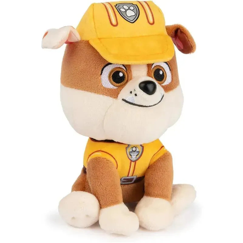 Plush toy of Rubble from PAW Patrol wearing a yellow construction uniform and cap, suitable for ages 1 and up.