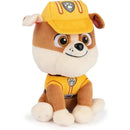 Plush toy of Rubble from PAW Patrol wearing a yellow construction uniform and cap, suitable for ages 1 and up.