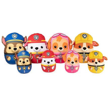 Squishy plush toys of PAW Patrol characters, including Chase, Marshall, Skye, and others, in vibrant colors.