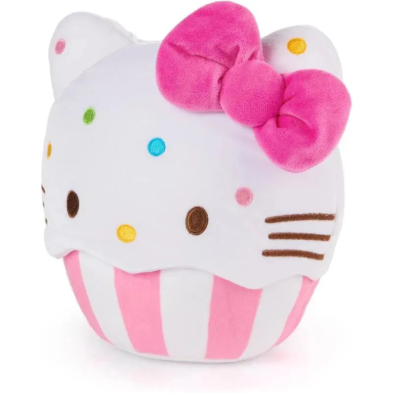 Hello Kitty plush cupcake with a pink bow, colorful sprinkles, and pink striped cupcake wrapper.
