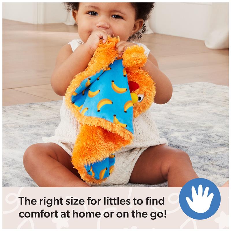 Child holding an orange plush security blanket with a blue banana print, promoting comfort for toddlers.