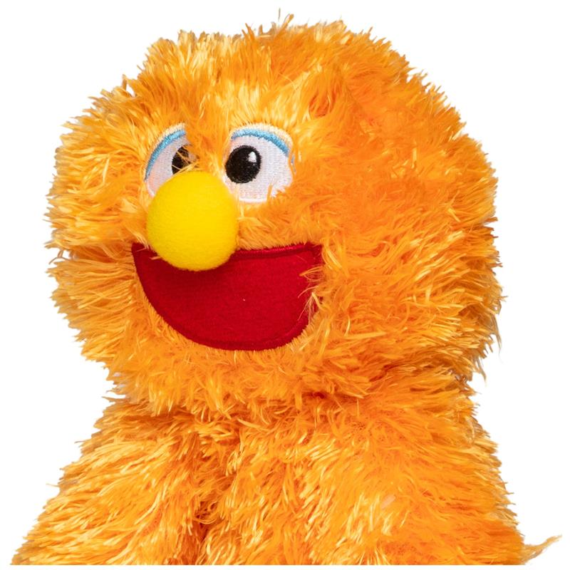 Huggable, bright orange security blanket featuring a smiling character with a round yellow nose and red mouth.