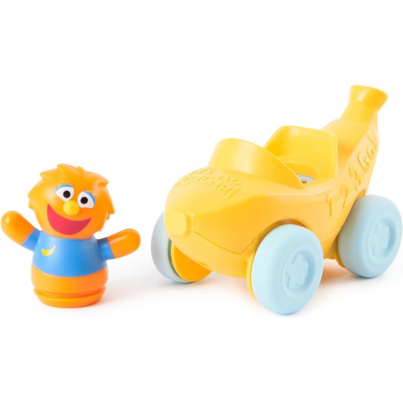 Spin Master Ms. Rachel figure alongside her yellow 1-2-3 Roll! vehicle, featuring a pull design and rolling wheels.