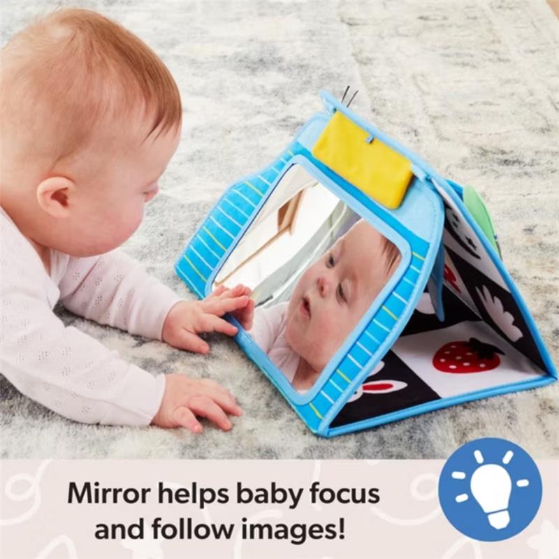 Baby interacting with the Spin Master Ms. Rachel Tummy Time Activity Bus, featuring a mirror and colorful patterns.
