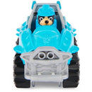 Spin Master Paw Patrol True Metal Dino Rescue Rex, featuring a blue vehicle with spikes and a dog character in a helmet.