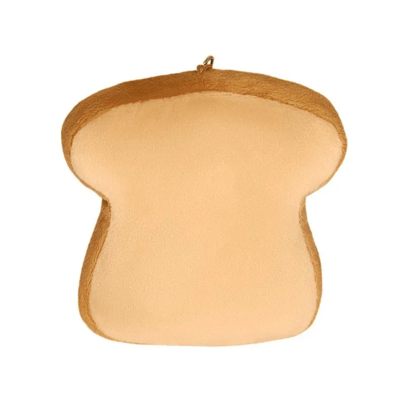 Soft plush keychain shaped like a slice of avocado toast, featuring a metal clip for attachment.