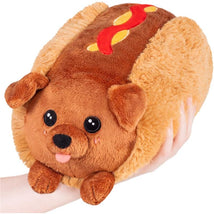 Mini Squishable Dachshund Hot Dog plush toy, featuring cute facial expression and plush hot dog bun design.