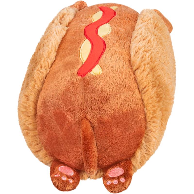 Mini Squishable Dachshund Hot Dog plush toy, featuring soft fur, a sausage body, and small paw details.