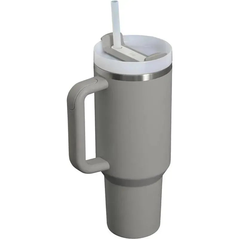 Stanley The Quencher H2.0 FlowState™ Tumbler 40 oz in ash color with a handle and a lid featuring a straw.