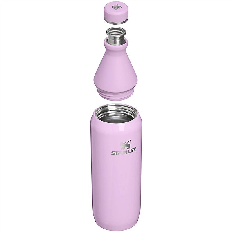 Stanley 20 oz All Day Slim Bottle in Soft Orchid Gloss, featuring a sleek design and removable lid.