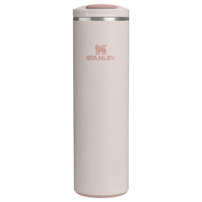 Stanley The Transit Fliptop Mug in Rose Quartz, 20 oz, with a sleek design and fliptop lid for easy drinking.