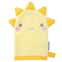 Bath mitt designed as a smiling sun, featuring yellow fabric, spiky rays, and cute facial details.