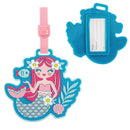 Mermaid-shaped luggage tag featuring a smiling mermaid with flowers and a fish, includes a slot for personal information.