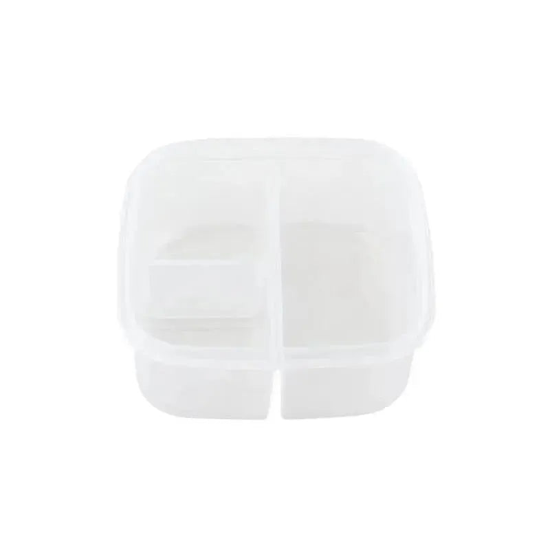 Snack box with an ice pack, featuring multiple compartments for food, designed in a dinosaur theme.