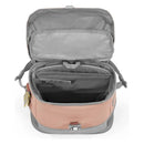 Stokke Jetkids Backpack in coral pink, featuring an open interior with multiple compartments and a zip closure.