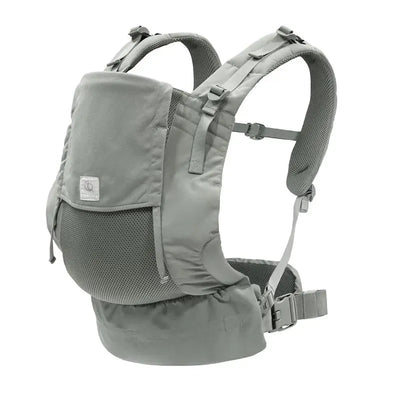 Stokke Limas™ Mesh baby carrier in Glacier Green, featuring adjustable straps and a soft, breathable design.