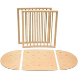 Stokke Sleepi Bed Extension components in natural wood finish, including curved and rectangular panels and slats.