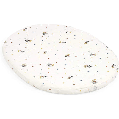 Fitted sheet for Stokke Sleepi Mini, featuring a playful Mickey Mouse pattern and colorful confetti dots.