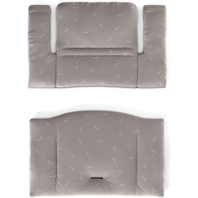 Stokke Tripp Trapp Classic Cushion in Icon Grey, features a soft, padded design with a minimalist white pattern.