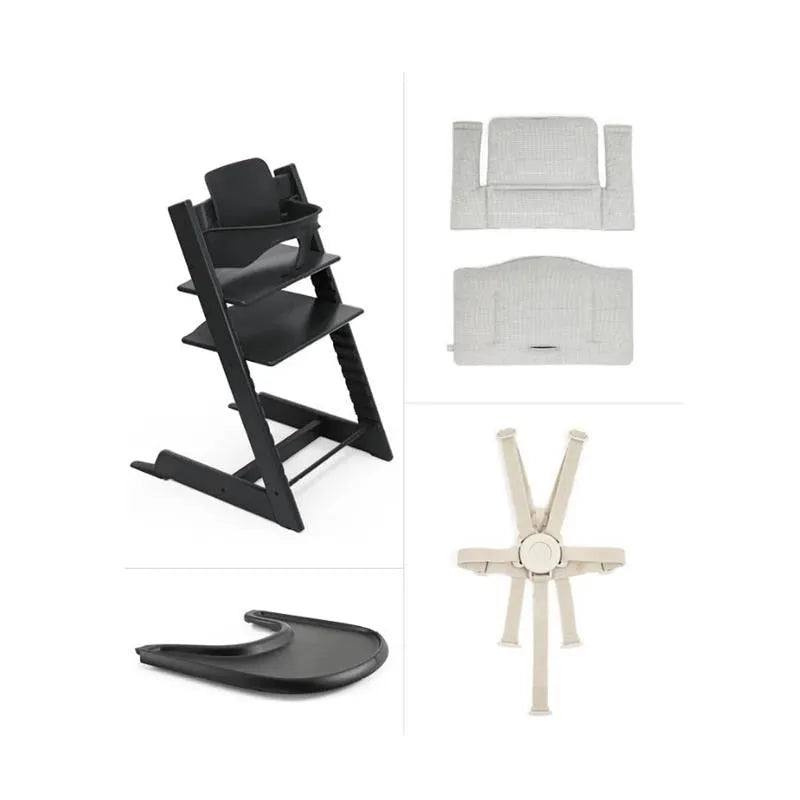Stokke Tripp Trapp® High Chair in black, with grey cushion, tray, and safety harness displayed separately.