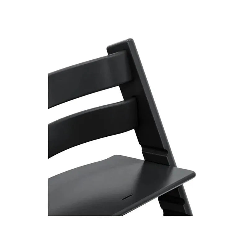 High chair with a modern design, featuring a sturdy frame and adjustable seat, showcasing the Glacier Green model.
