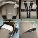 Taupe Stokke Yoyo 0+ Newborn Pack showcasing soft padded pillow, 5-point harness, removable foot cover, and ventilation window.