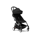 Stokke Yoyo³ Stroller in black with a canopy, designed for children 6 months and older, featuring a compact fold and leg rest.