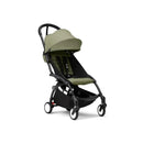 Stokke Yoyo³ stroller with a black frame and olive bundle leg rest, featuring a collapsible design and adjustable canopy.