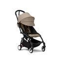 Stokke Yoyo³ stroller 6+, featuring a black frame and taupe fabric, with a foldable design and leg rest.