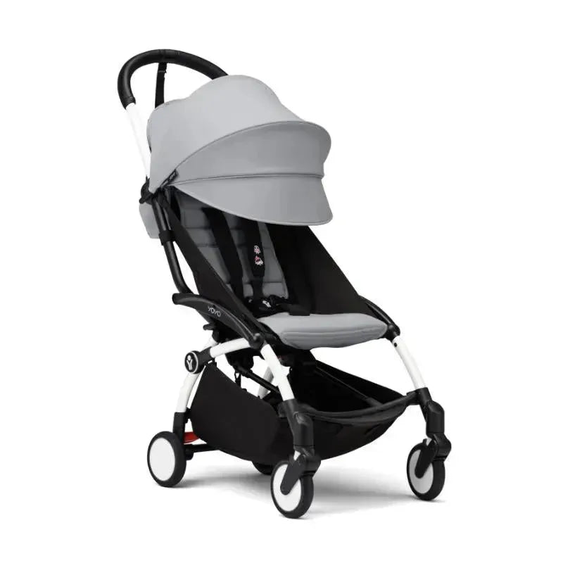 Stokke Yoyo³ Stroller in stone color, featuring a large canopy, padded seat, and compact design for easy transport.
