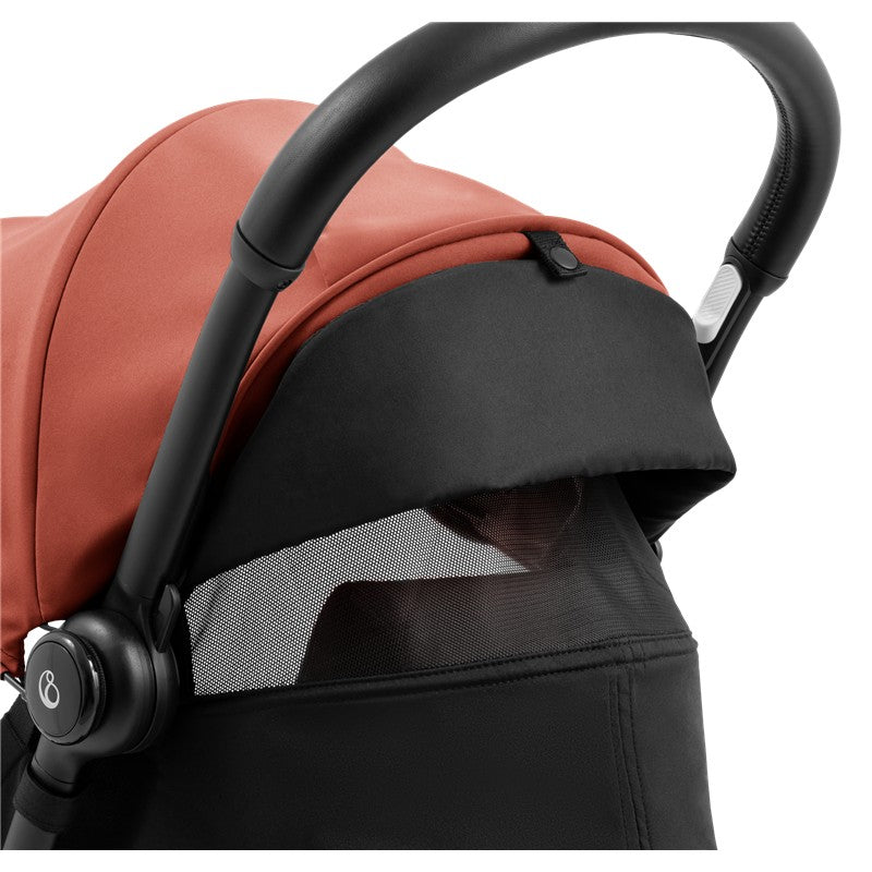 Stokke Yoyo5 Compact Stroller with a black frame and a berry canopy, featuring a mesh window for ventilation.