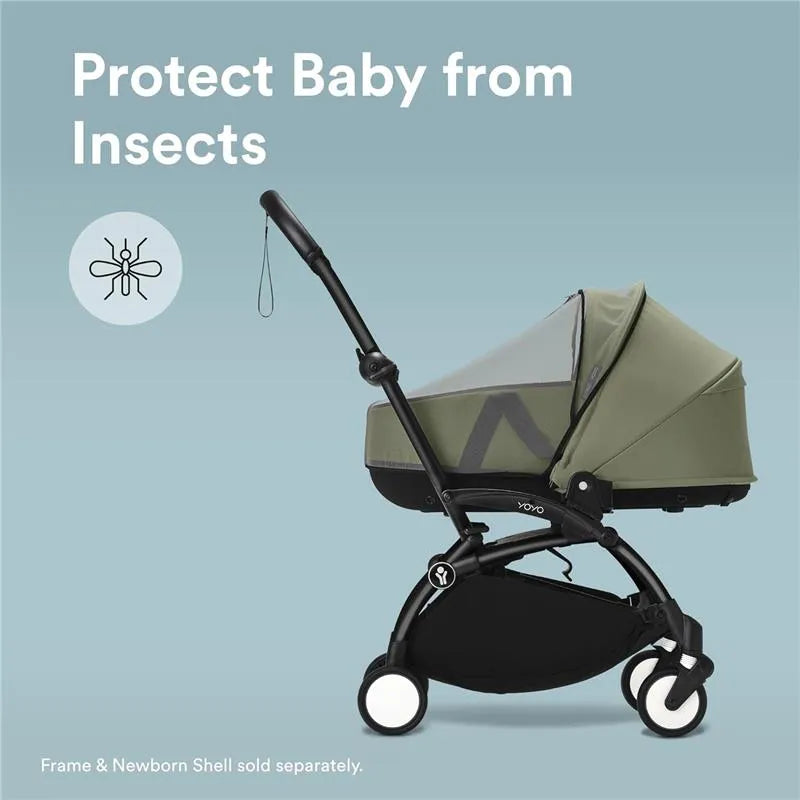 Yoyo® Newborn Shell Mosquito Net in black protects infants from insects, displayed on a stroller frame with a light green canopy.