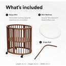 Stokke® Sleepi™ Mini Bundle in Warm Brown includes a crib with perforated mattress base, mini mattress, and drape rod.