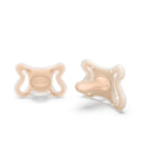 Two Suavinex silicone baby pacifiers with SX Pro physiological nipple, featuring a fair color and ergonomic design.