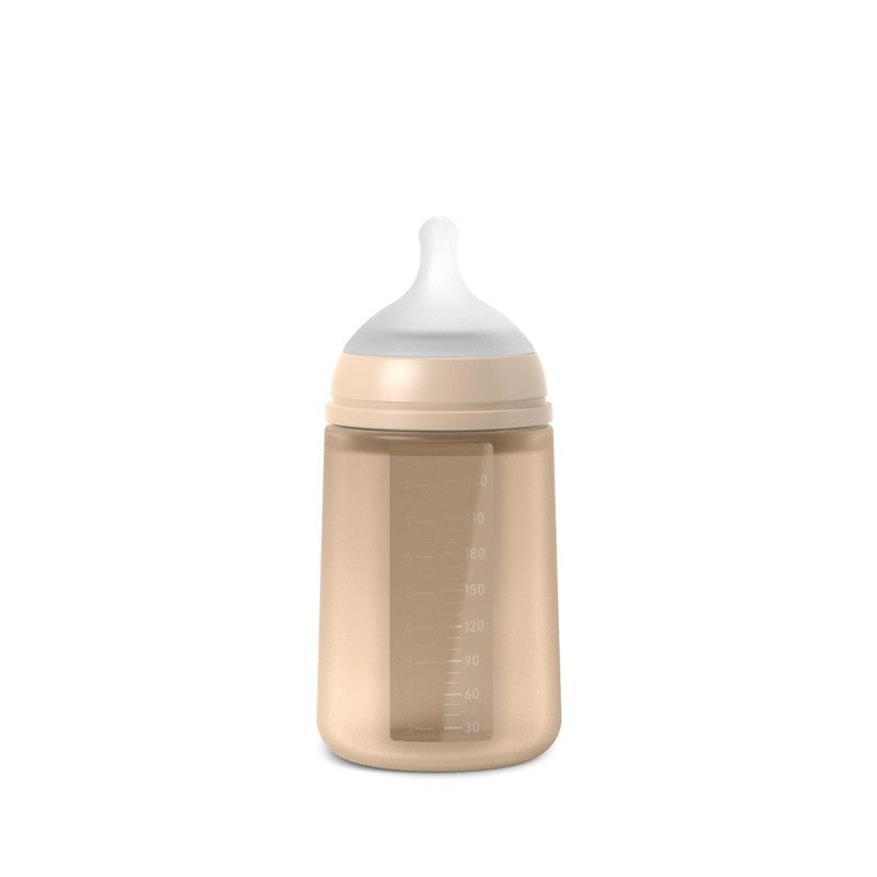 Suavinex Color Essence SX Pro™ Silicone Bottle 8 oz in Irish Cream with measurement markings and a soft silicone nipple.