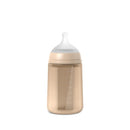 Suavinex Color Essence SX Pro™ Silicone Bottle 8 oz in Irish Cream with measurement markings and a soft silicone nipple.