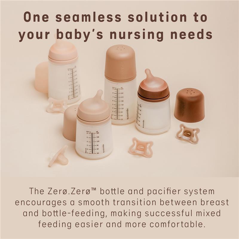 Suavinex Zero Zero Newborn Starter Set featuring small anti-colic baby bottles and a pacifier in soft colors for nursing needs.