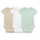 Three short-sleeve organic cotton bodysuits in soft jadeite, white, and sand dollar colors, featuring snap closures at the bottom.