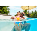 Child and adult enjoy the pool with a Swimways Paw Patrol floating figure, featuring colorful details and smiles.