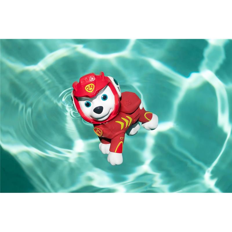 Paw Patrol floating figure of a dog in a red costume, swimming in clear blue water.
